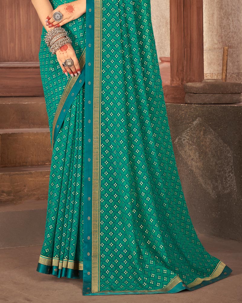 Vishal Prints Teal Blue Georgette Saree With Foil Print And Zari Border
