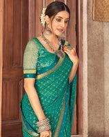Vishal Prints Teal Blue Georgette Saree With Foil Print And Zari Border