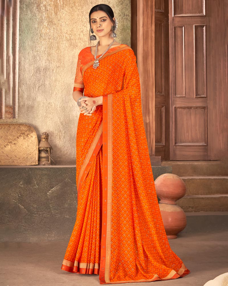 Vishal Prints Orange Georgette Saree With Foil Print And Zari Border