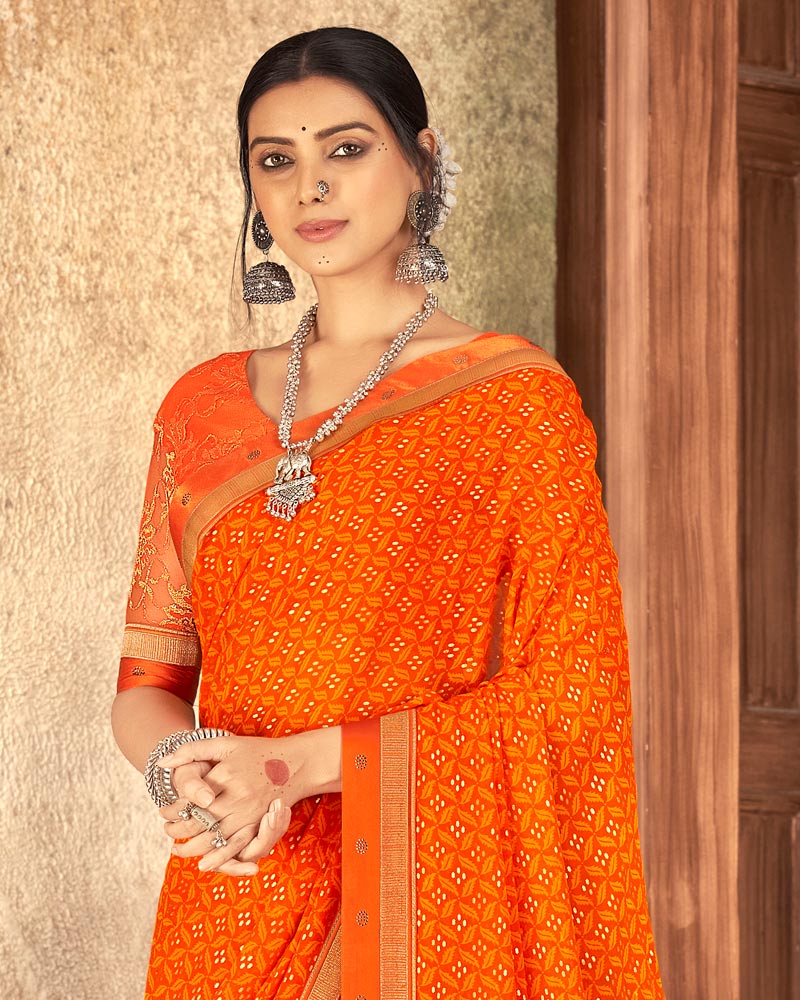 Vishal Prints Orange Georgette Saree With Foil Print And Zari Border