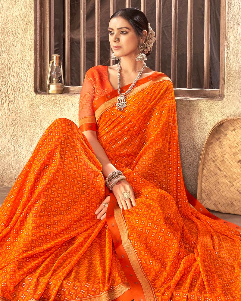 Vishal Prints Orange Georgette Saree With Foil Print And Zari Border