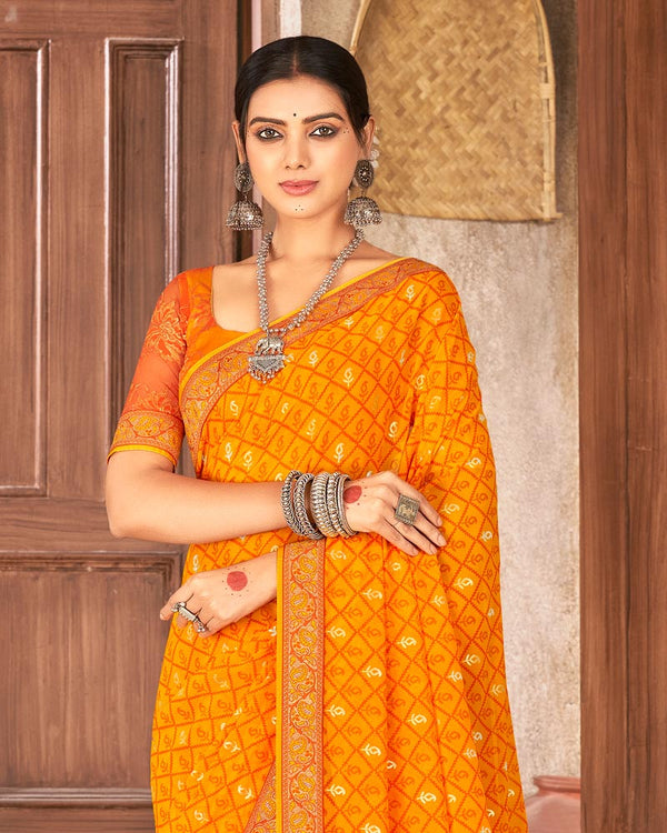 Vishal Prints Yellowish Orange Georgette Saree With Foil Print And Zari Border