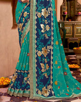 Vishal Prints Teal Blue Printed Brasso Saree With Foil Print And Fancy Border