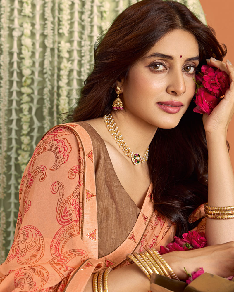 Vishal Prints Pale Orange Printed Georgette Saree With Fancy Border