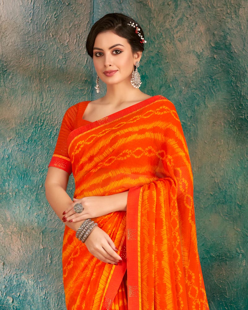 Vishal Prints Orange Printed Chiffon Saree With Fancy Border
