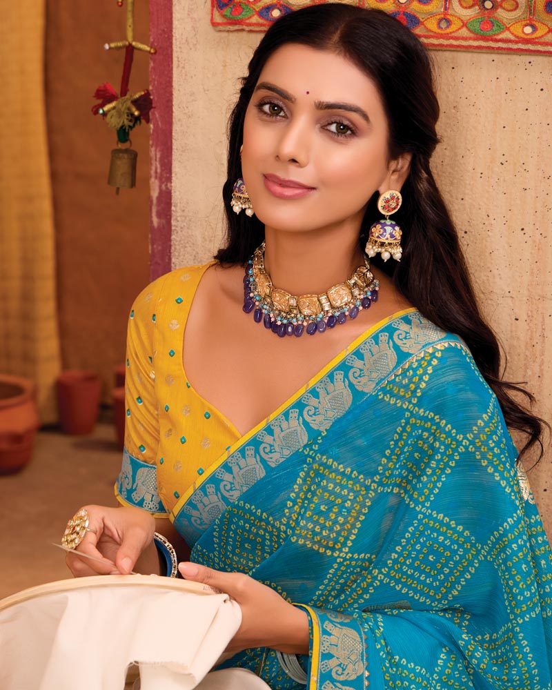 Vishal Prints Sky Blue Printed Chiffon Saree With Foil Print And Fancy Border