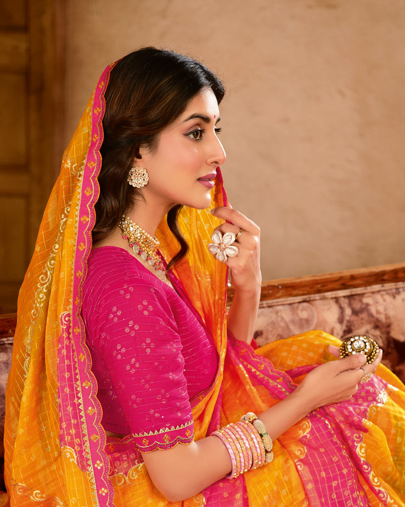 Vishal Prints Orangish Pink Checks Chiffon Printed Bandhani Print Saree With Foil Print And Cut Work Embroidery Border