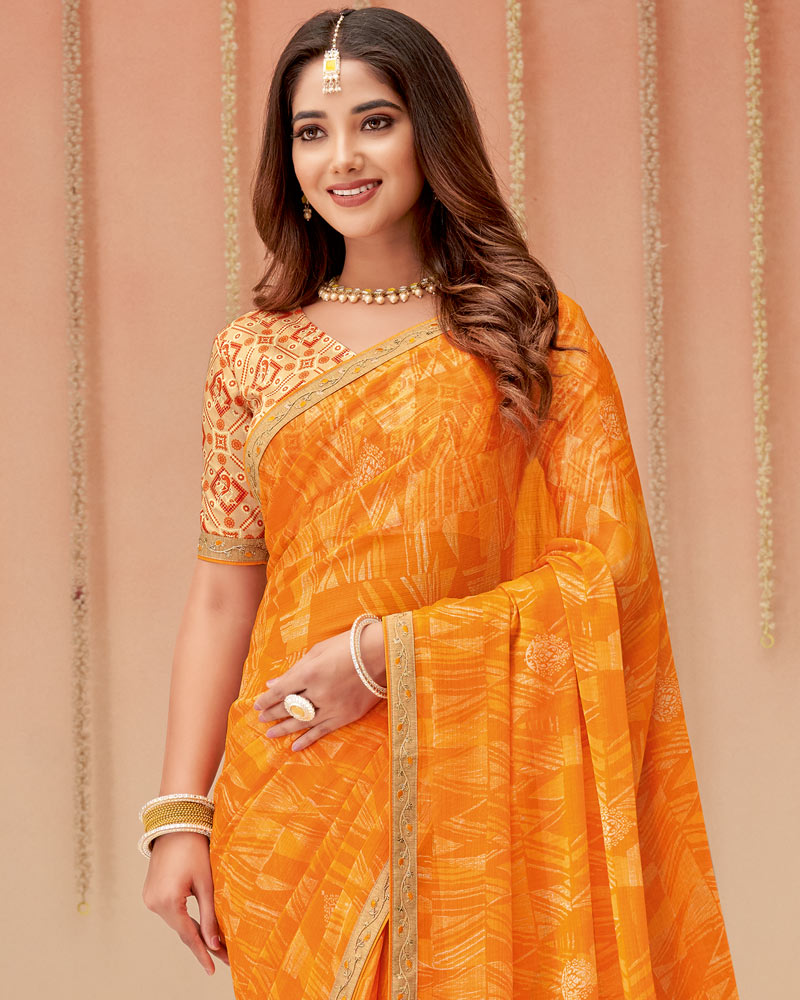 Vishal Prints Saffron Color Printed Chiffon Saree With Fancy Embroidery Work Border