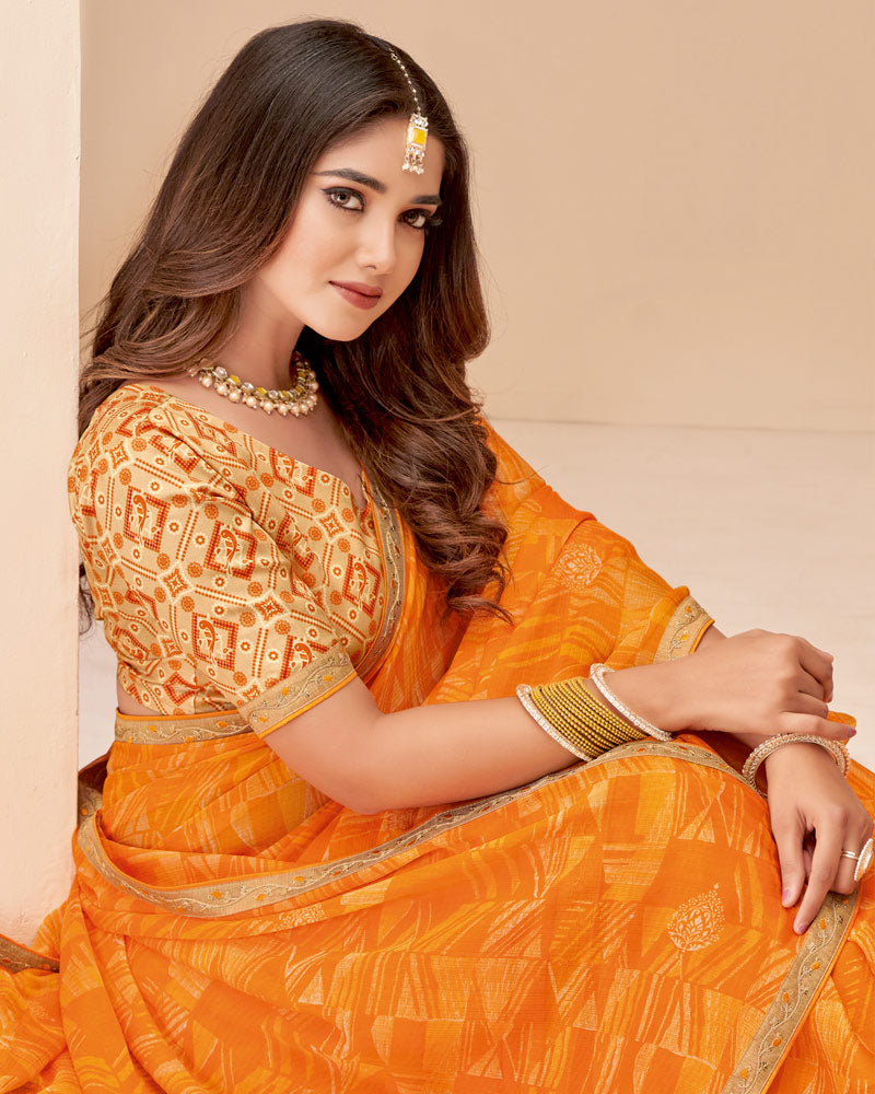 Vishal Prints Saffron Color Printed Chiffon Saree With Fancy Embroidery Work Border