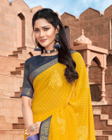 Vishal Prints Yellow Georgette Saree With Foil Work And Zari Border