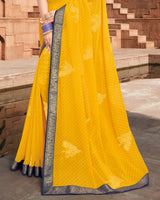 Vishal Prints Yellow Georgette Saree With Foil Work And Zari Border