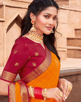 Vishal Prints Bright Orange Georgette Saree With Foil Work And Zari Border