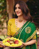 Vishal Prints Forest Green Traditional Print Chiffon Saree With Foil Print And Fancy Embroidered Border