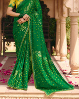 Vishal Prints Pine Green Traditional Print Chiffon Saree With Foil Print And Fancy Embroidered Border