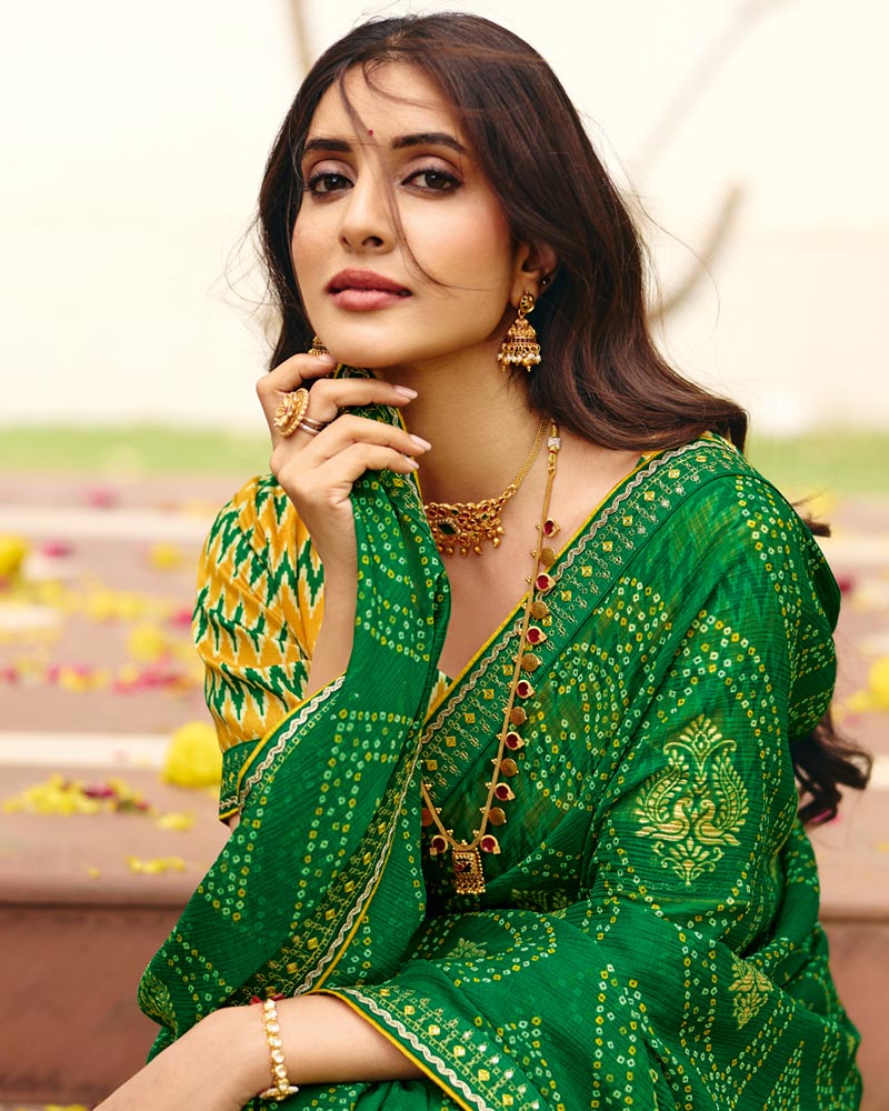 Vishal Prints Spinach Green Traditional Print Chiffon Saree With Foil Print And Fancy Embroidered Border