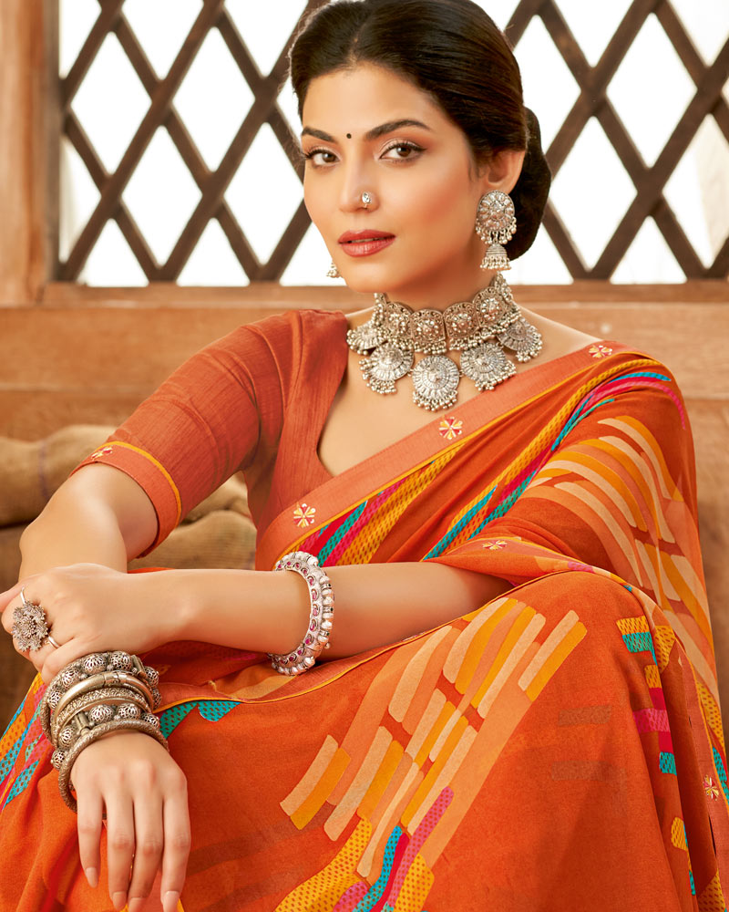 Vishal Prints Dark Orange Weightless Printed Georgette Saree With Fancy Border