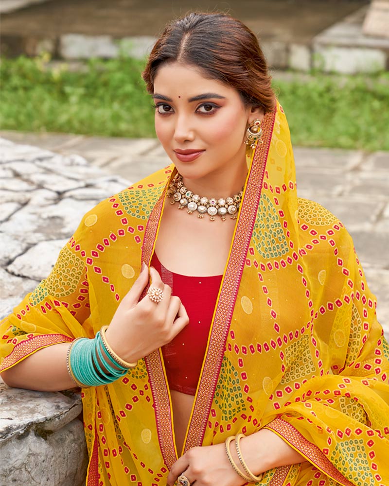 Vishal Prints Burnt Yellow Printed Chiffon-Brasso Saree With Zari Border
