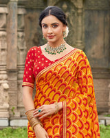 Vishal Prints Carrot Orange And Persian Red Printed Chiffon-Brasso Saree With Zari Border