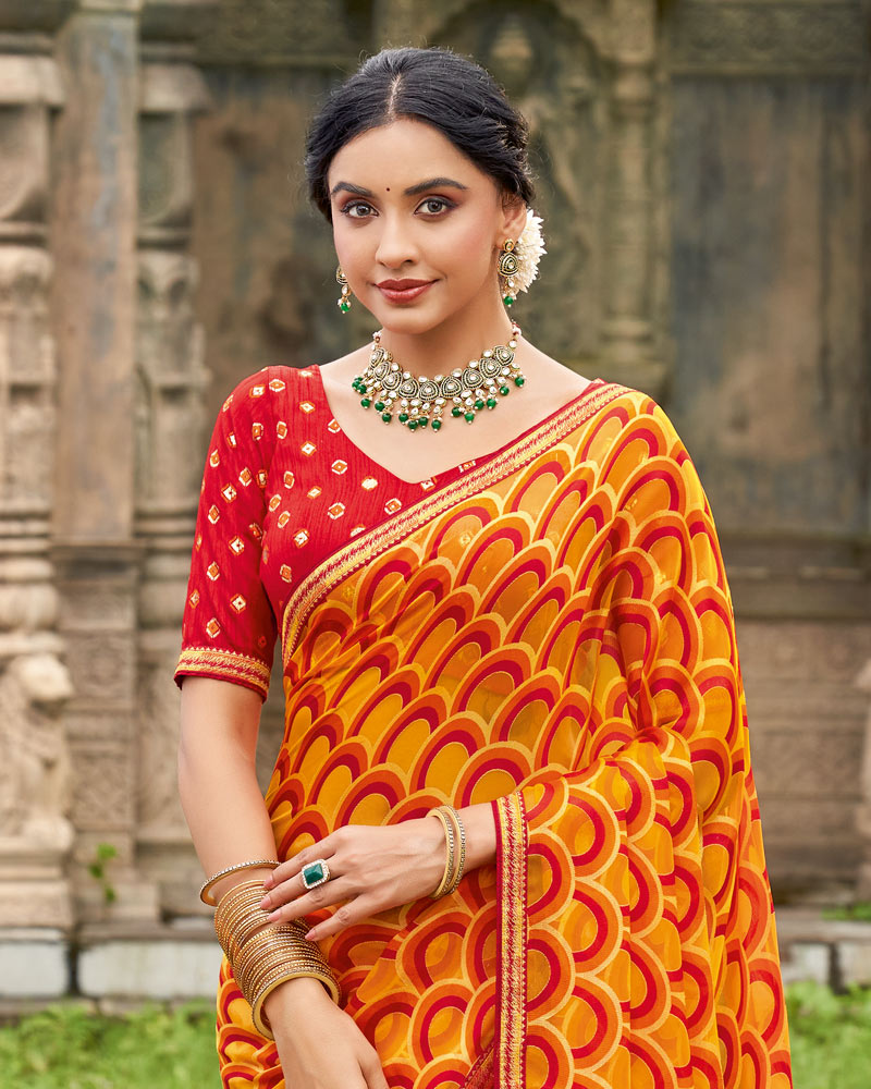 Vishal Prints Carrot Orange And Persian Red Printed Chiffon-Brasso Saree With Zari Border