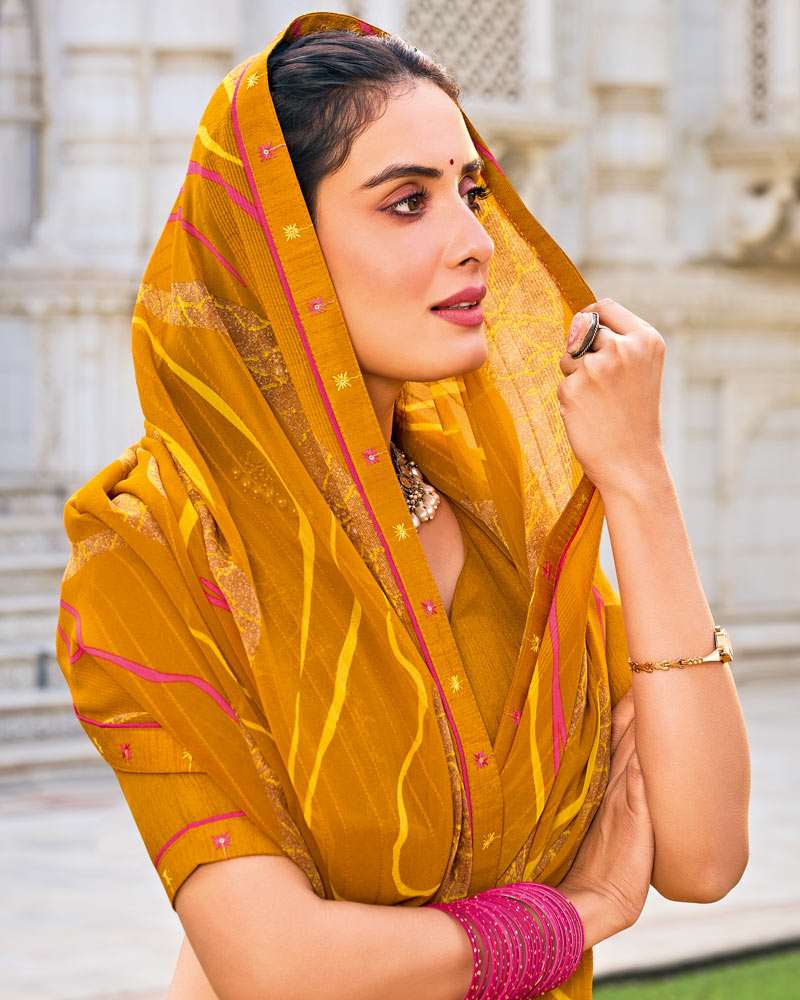 Vishal Prints Rusty Orange Printed Patterned Georgette Saree With Fancy Border