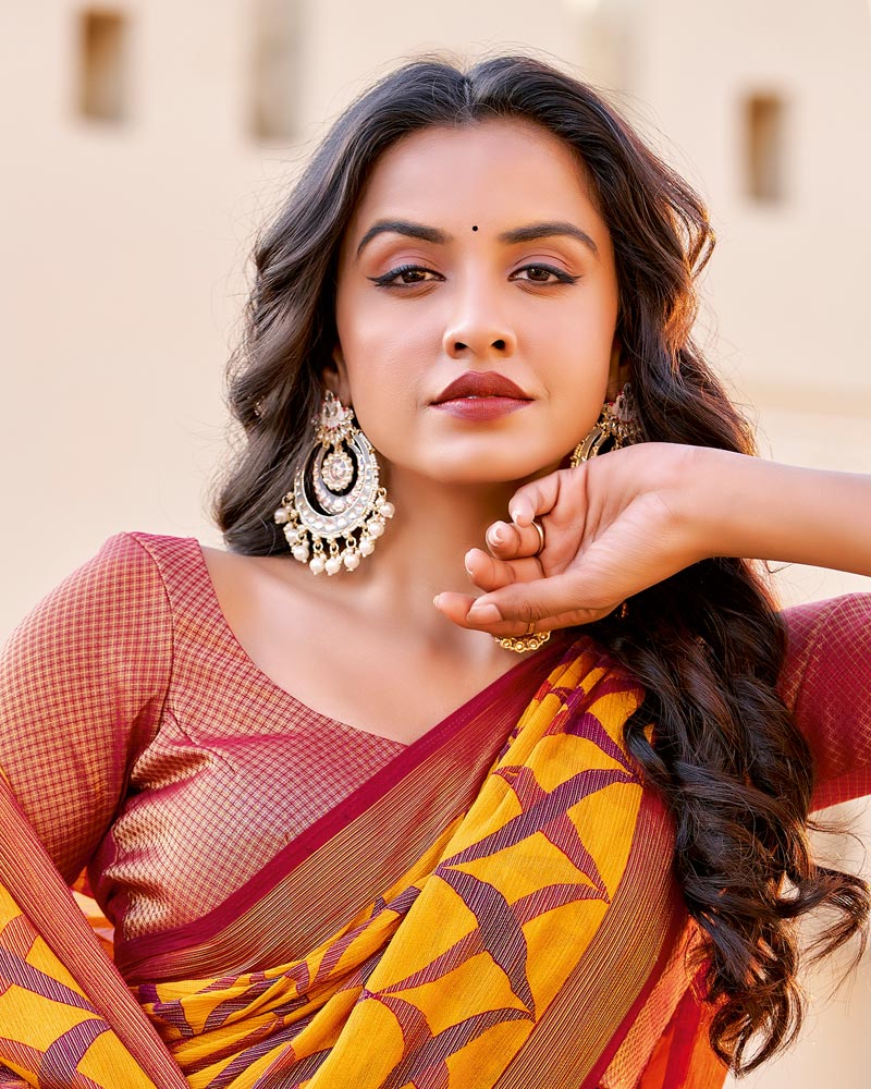 Vishal Prints Orange Brasso Saree With Tassel