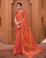 Vishal Prints Sunset Orange Printed Patterned Brasso Bandhani Print Saree With Fancy Border
