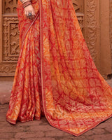 Vishal Prints Sunset Orange Printed Patterned Brasso Bandhani Print Saree With Fancy Border