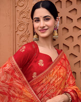Vishal Prints Sunset Orange Printed Patterned Brasso Bandhani Print Saree With Fancy Border
