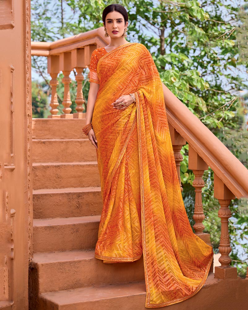 Vishal Prints Saffron Orange Printed Patterned Brasso Bandhani Print Saree With Fancy Border