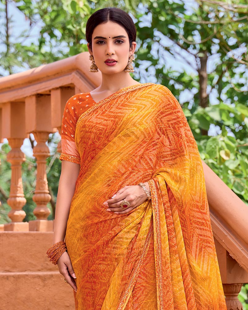 Vishal Prints Saffron Orange Printed Patterned Brasso Bandhani Print Saree With Fancy Border