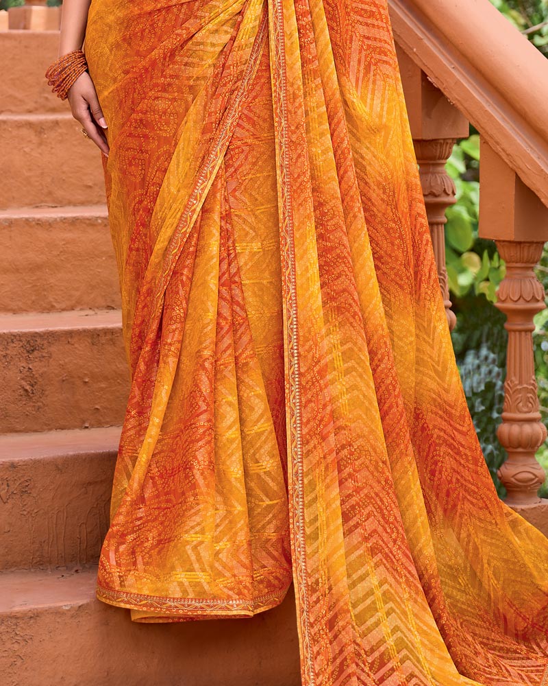 Vishal Prints Saffron Orange Printed Patterned Brasso Bandhani Print Saree With Fancy Border