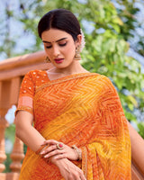 Vishal Prints Saffron Orange Printed Patterned Brasso Bandhani Print Saree With Fancy Border