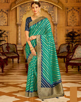 Vishal Prints Dark Turquoise Blue Tissue Weaving Saree With Stone Work And Tassel