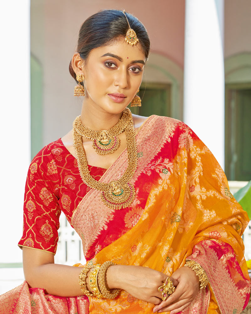 Vishal Prints Yellowish Orange Organza Zari Weaving Saree With Diamond Work And Tassel