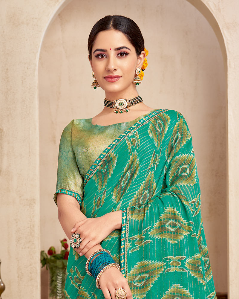 Vishal Prints Teal Green Printed Brasso Saree With Fancy Border
