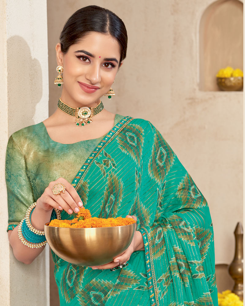 Vishal Prints Teal Green Printed Brasso Saree With Fancy Border