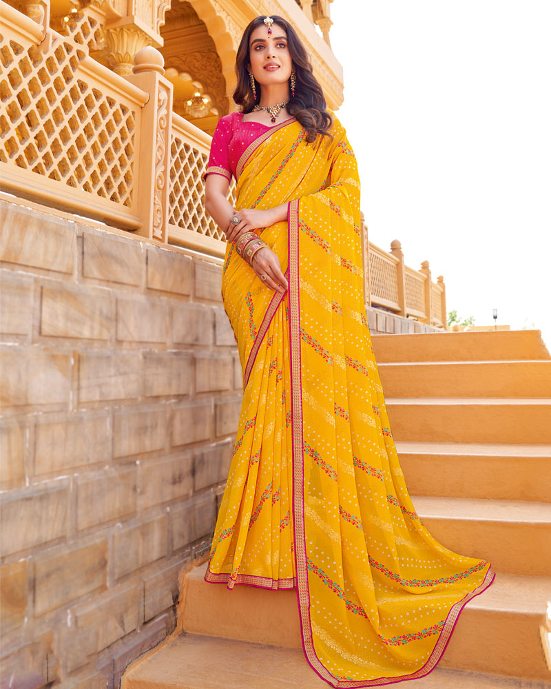 Vishal Prints Yellowish Orange Printed Georgette Saree With Foil Print And Zari Border