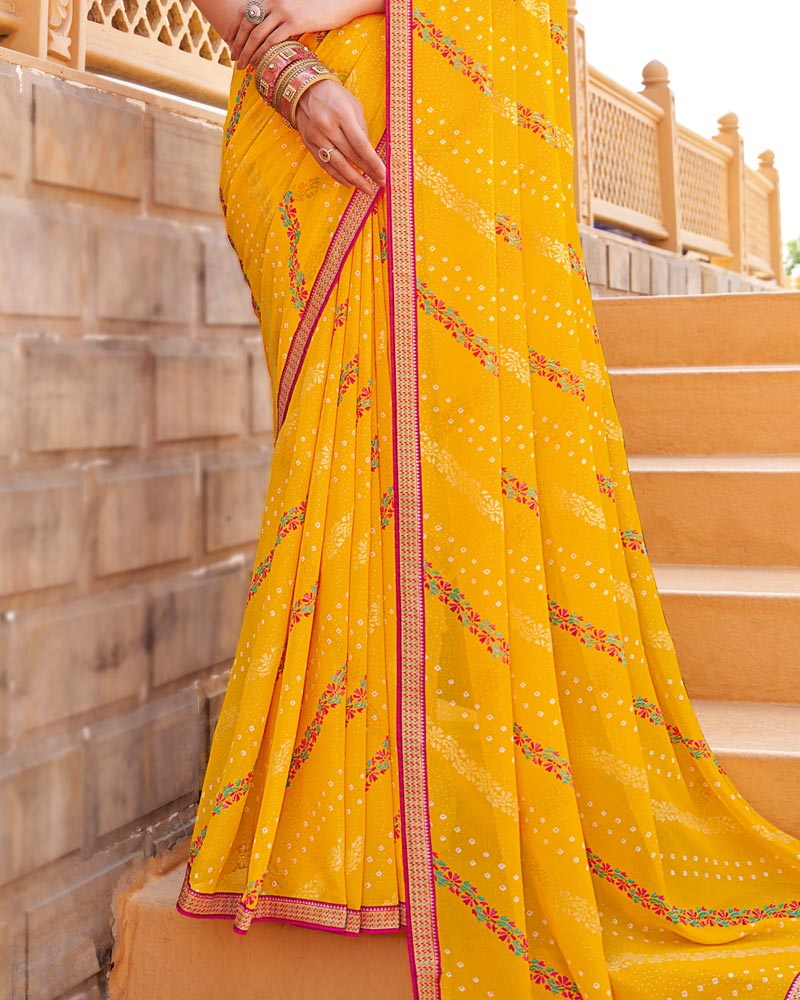 Vishal Prints Yellowish Orange Printed Georgette Saree With Foil Print And Zari Border