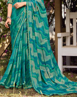 Vishal Prints Teal Blue Printed Chiffon-Brasso Saree With Fancy Border