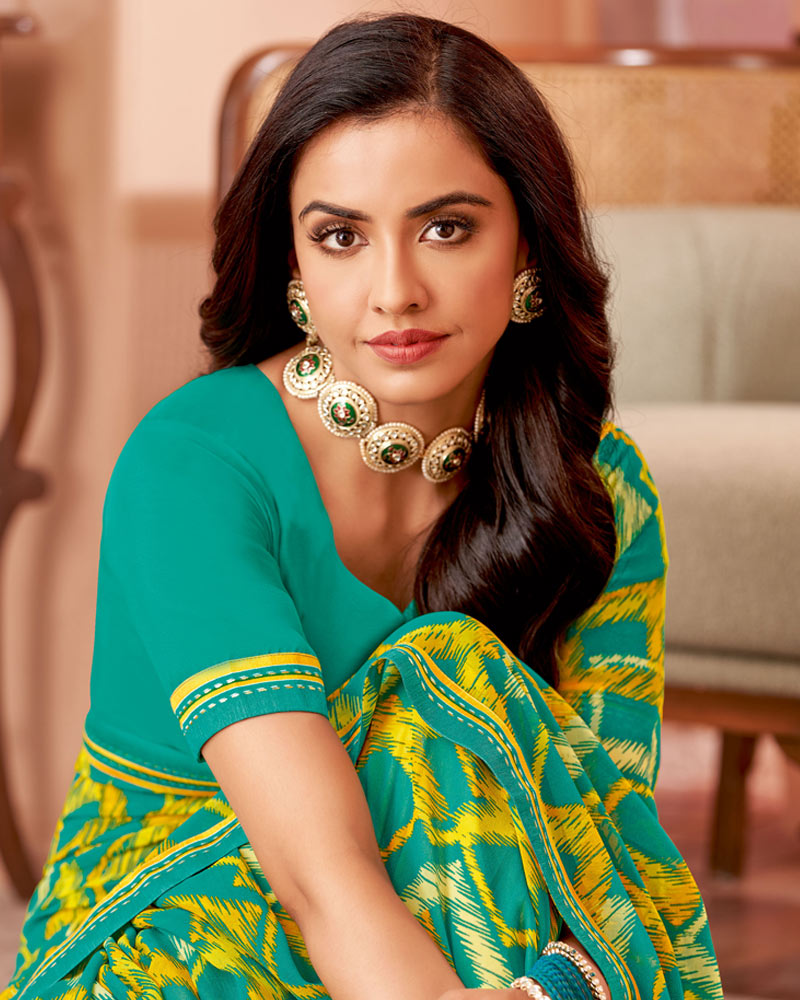 Vishal Prints Teal Blue Printed Georgette Saree With Fancy Border
