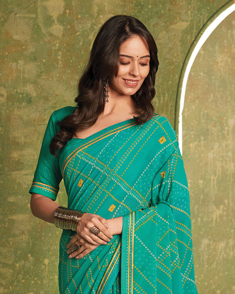 Vishal Prints Teal Green Printed Georgette Saree With Fancy Border