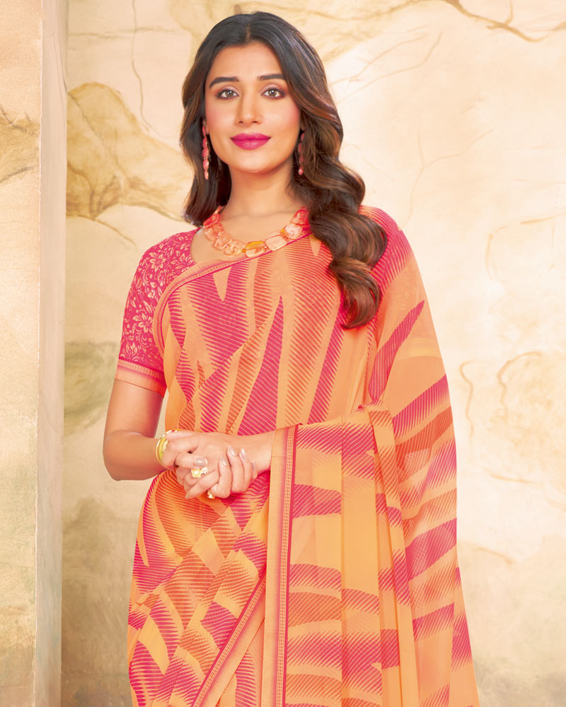 Vishal Prints Pastel Orange Printed Georgette Saree With Fancy Border