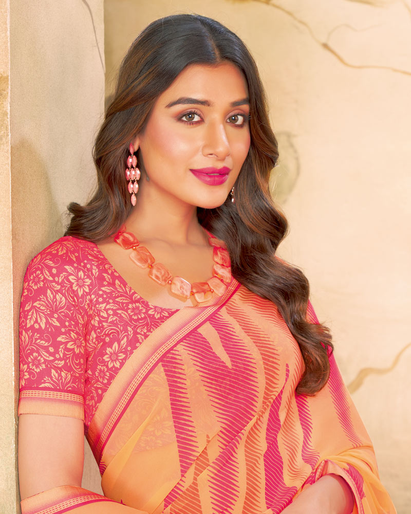 Vishal Prints Pastel Orange Printed Georgette Saree With Fancy Border