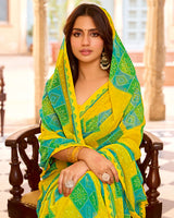 Vishal Prints Burnt Yellow Printed Georgette Saree With Fancy Border