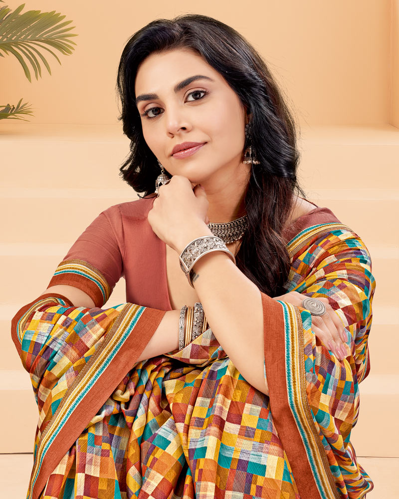 Vishal Prints Rusty Orange Printed Criva Crepe Saree With Printed Fancy Border