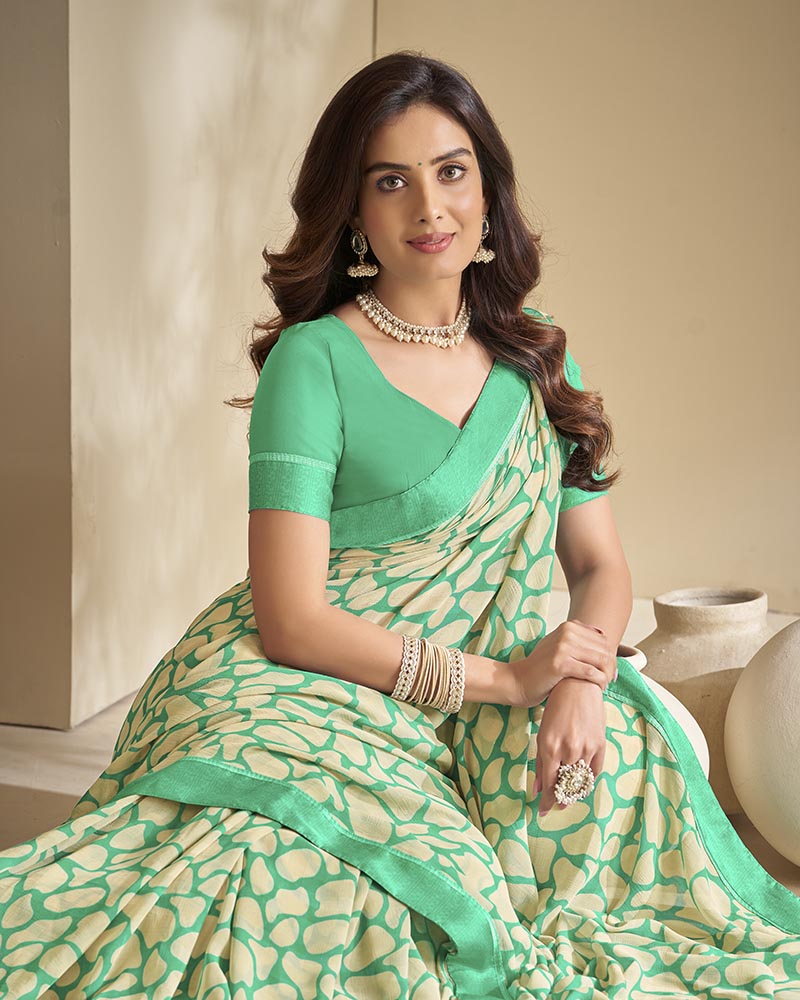 Vishal Prints Rama Green And Cream Georgette Saree With Border