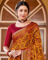 Vishal Prints Orange Printed Brasso Saree With Border