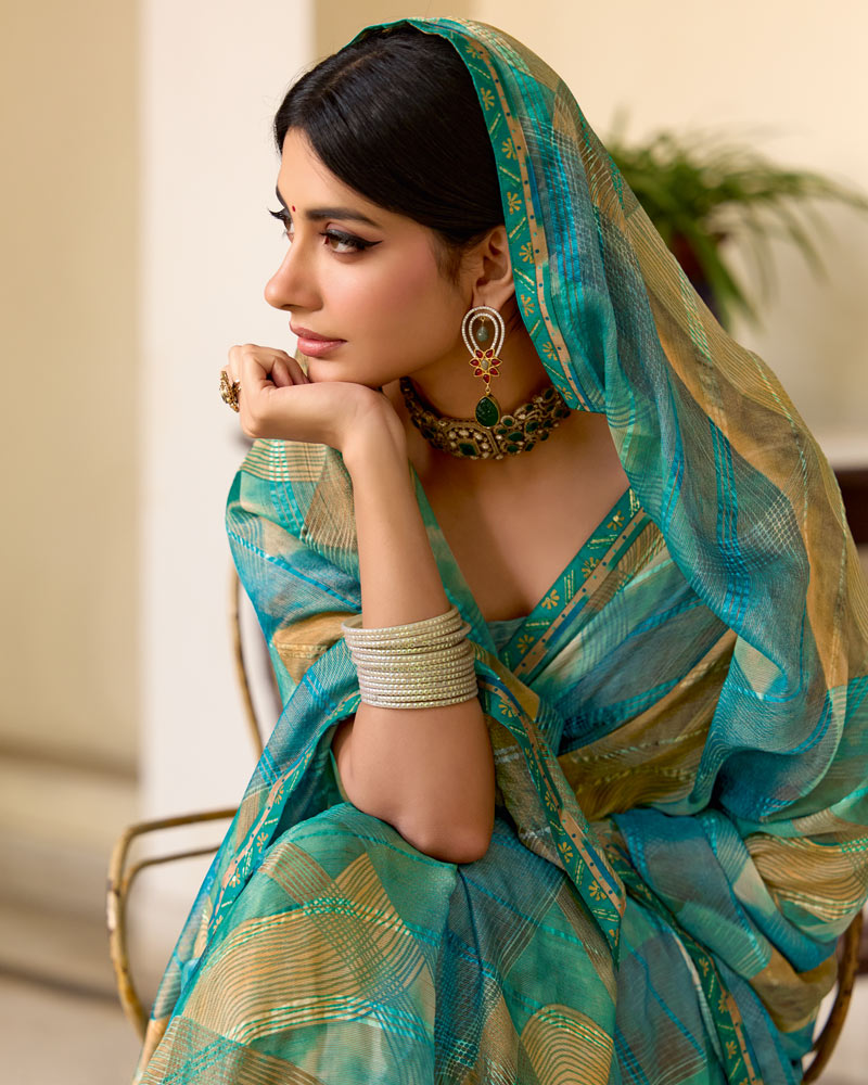 Vishal Prints Dusty Teal Blue Printed Patterned Brasso Saree With Fancy Border