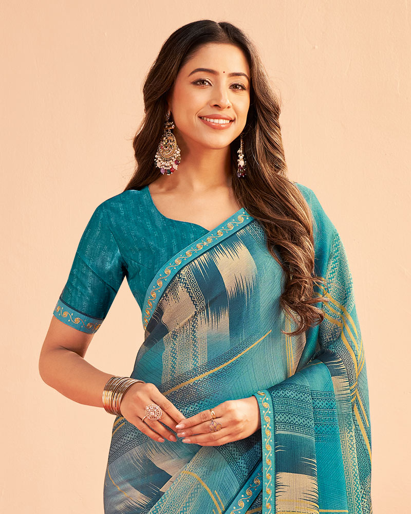 Vishal Prints Dusty Teal Blue Printed Chiffon Saree With Fancy Embroidery Border