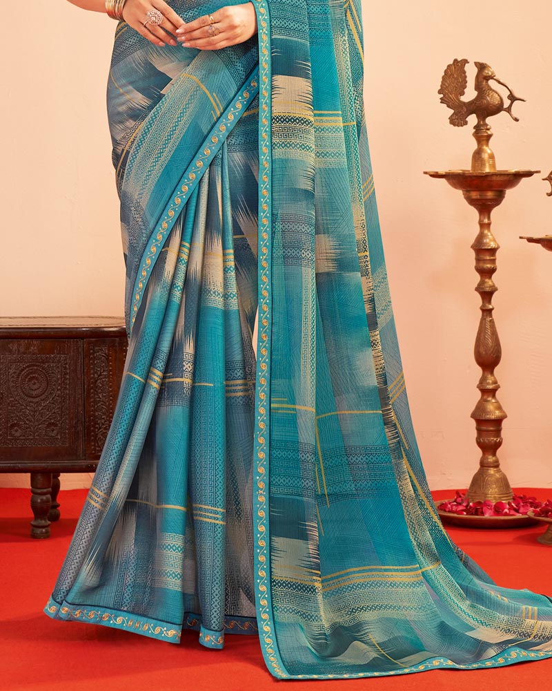 Vishal Prints Dusty Teal Blue Printed Chiffon Saree With Fancy Embroidery Border